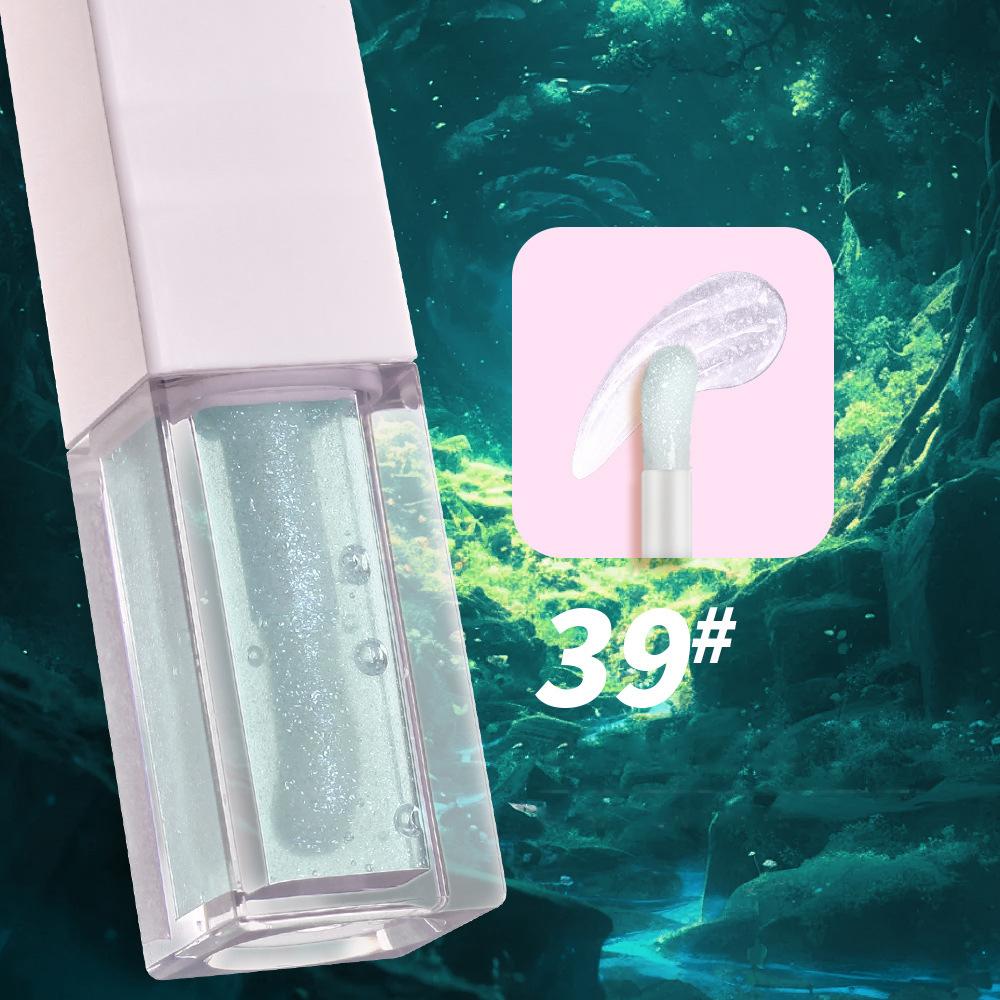 Wholesale Mini Plump Moisturizing Tone Magic Lip Oil Vegetarian Fruit Shimmer Lip Oil Private Label Liquid Clear Lip Gloss